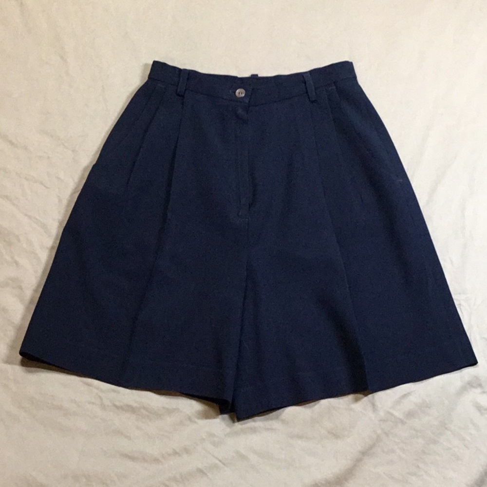 UTY Apparel short black pleated skirt.